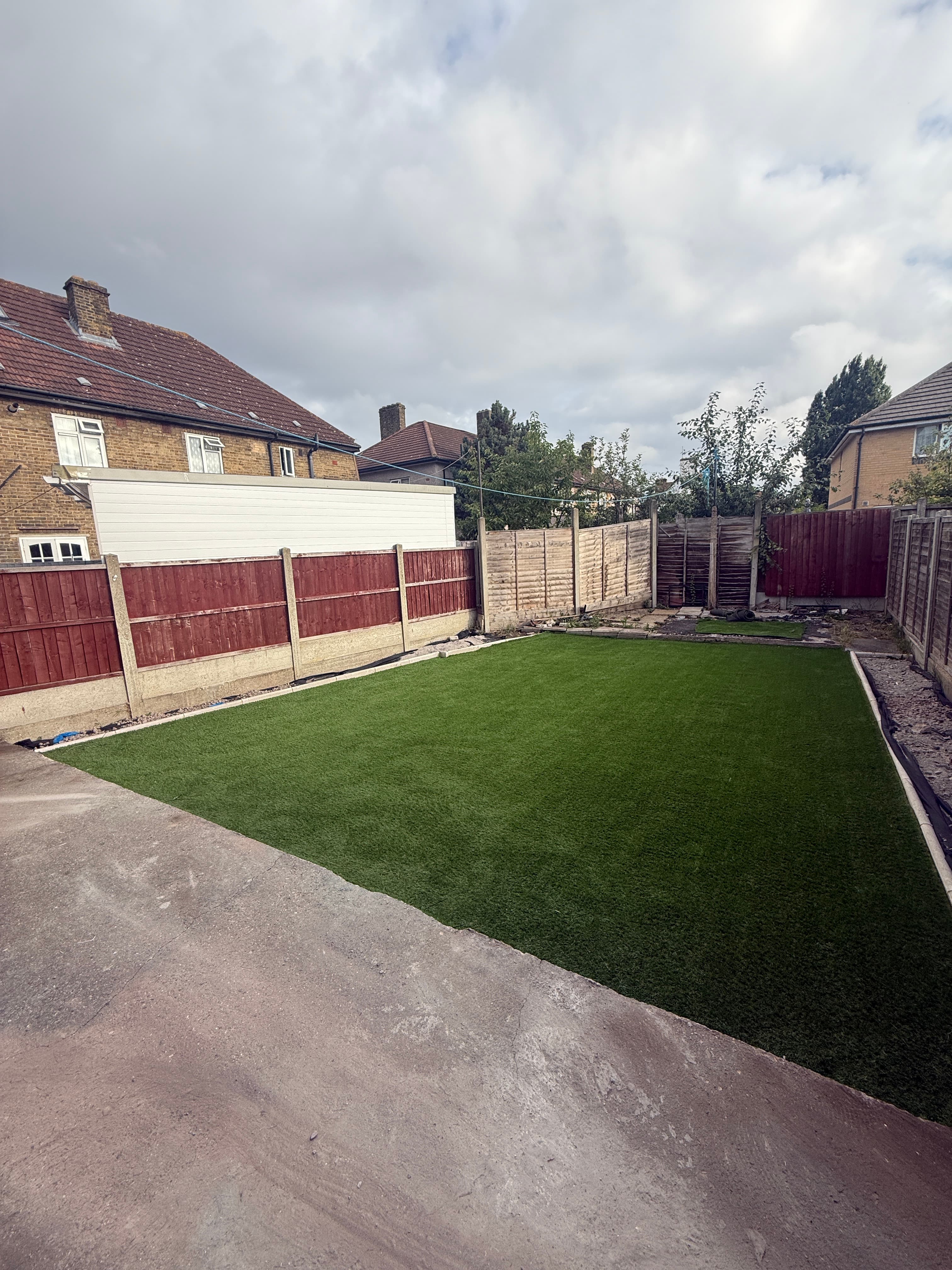 Family-friendly artificial grass installation in Romford after completion