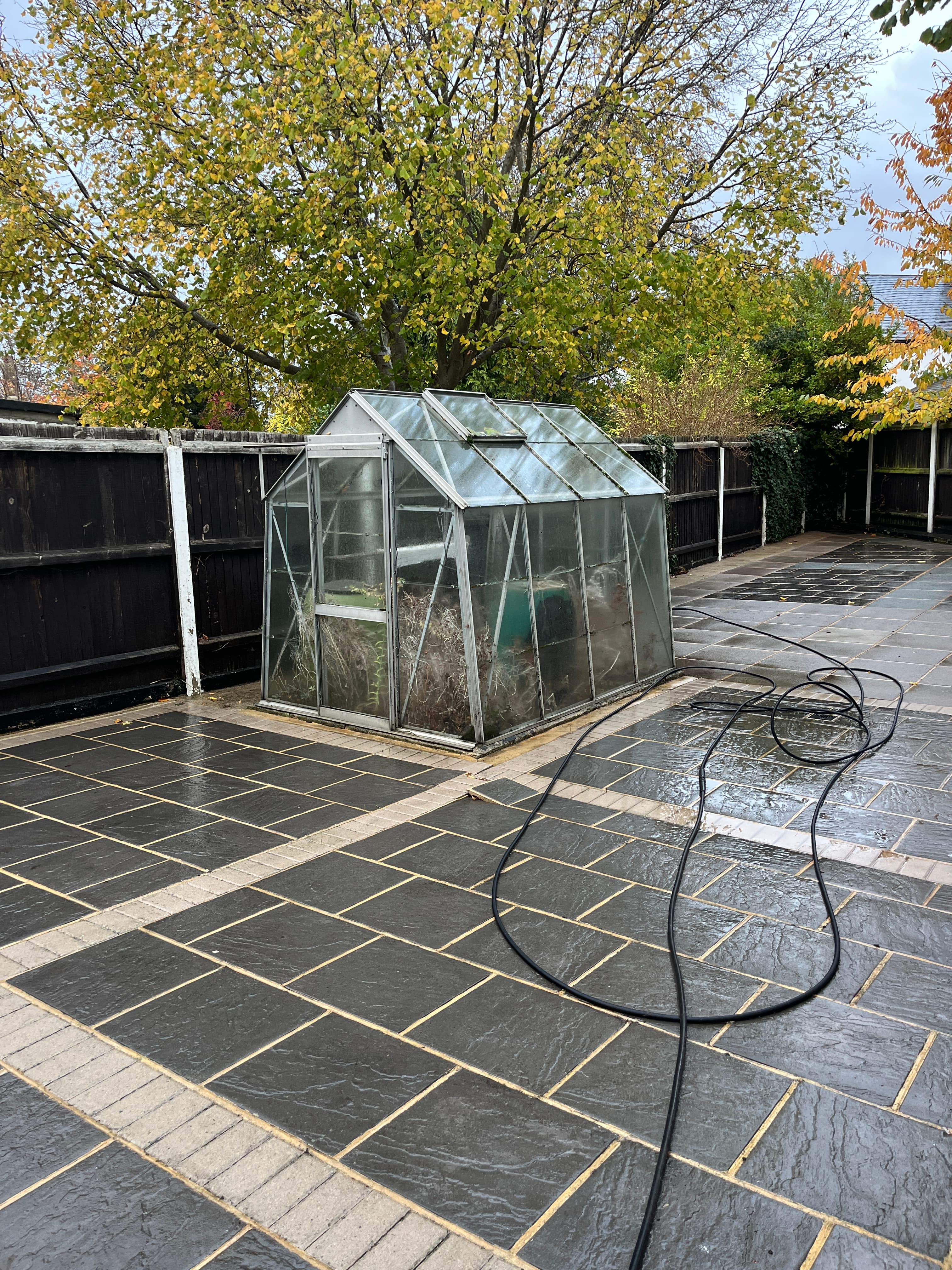 Patio restored to a clean professional finish in Woodford after completion